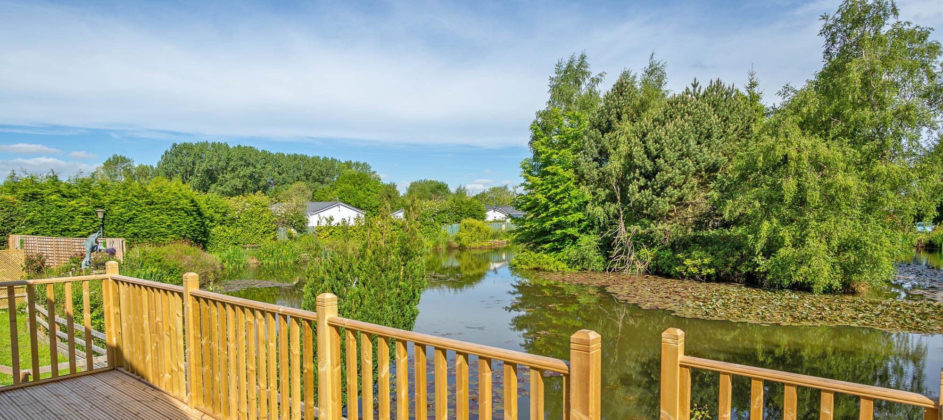 view from decking onto lake at Vale of York